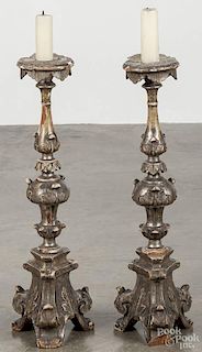 Pair of Continental carved and gessoed ecclesiastical candlesticks, late 19th c., 25'' h.