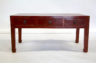 A Red Lacquered Chinese Three Drawer Coffee Table.