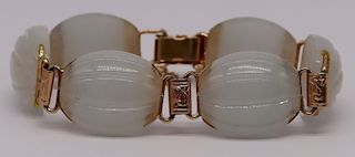 JEWELRY. Ming's 14kt Gold and Jade Bracelet.