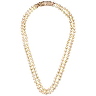 CULTURED PEARLS AND DIAMONDS NECKLACE. 14K YELLOW GOLD