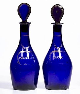 ENGLISH COLORED-GLASS PAIR OF PINT DECANTERS