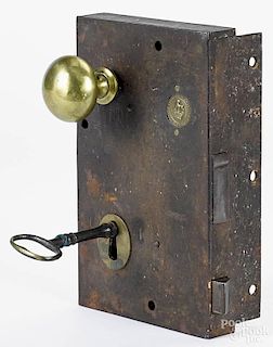 English brass and iron carpenter lock, stamped J. Young, 9'' x 5 1/2''.