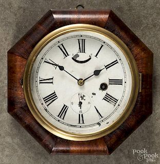 New Haven, Connecticut, regulator wall clock, early 20th c., with a paper label on reverse, 9'' dia.
