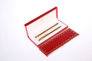 MUST DE CARTIER, A CASED SET OF FOUNTAIN PEN AND PROPELLING