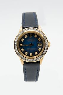 A LADY'S 18ct GOLD ROLEX OYSTER WATCH WITH DIAMOND BEZEL. C
