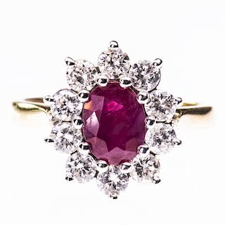 AN 18CT YELLOW GOLD, RUBY AND DIAMOND CLUSTER RING, the ova