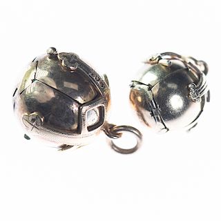 TWO 9CT YELLOW GOLD MASONIC BALLS, both stamped 9ct. Total 