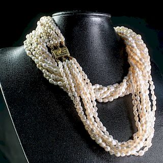 A MULTI SEED PEARL NECKLACE, the multi strands of seed pear