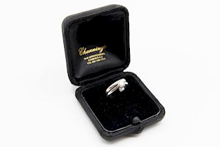 A PLATINUM AND DIAMOND RING, the single brilliant cut diamo
