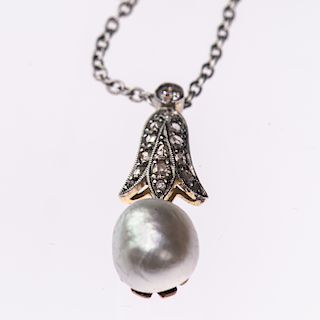 A NATURAL SALTWATER PEARL AND DIAMOND PENDANT, the pearl se