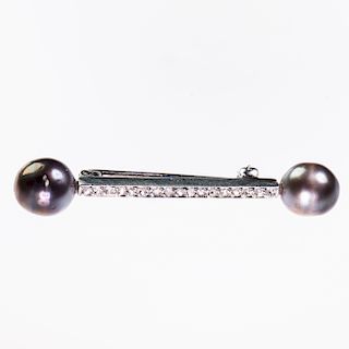 A CARTIER DIAMOND AND NATURAL SALTWATER PEARL BROOCH, the r