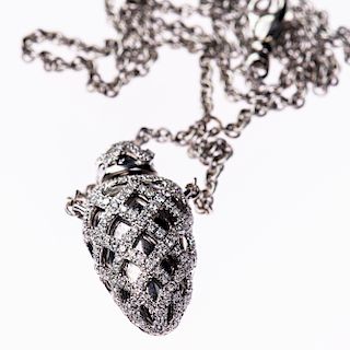 AN 18CT WHITE GOLD AND DIAMOND SET SCENT FLASK NECKLACE BY 