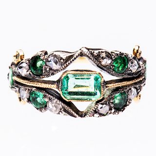 A MID 19TH CENTURY GREEN STONE RING, the central green ston