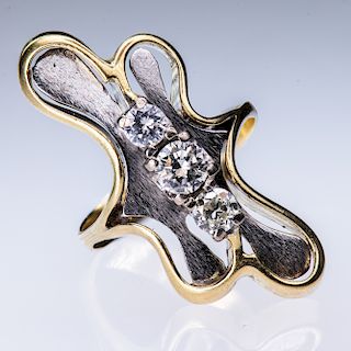 A CONTEMPORARY DALI STYLE DIAMOND SET RING, the abstract mo