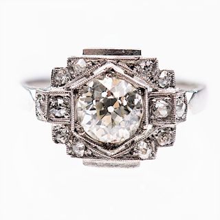 A DIAMOND RING, in Art Deco style, the large principle bril