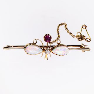 A VICTORIAN OPAL BAR BROOCH, the two oval opals and single 