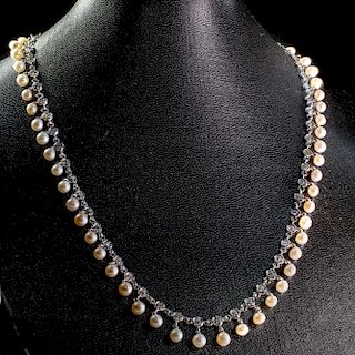 AN 18CT WHITE GOLD CULTURED PEARL AND DIAMOND NECKLACE, the
