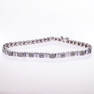 AN 18CT WHITE GOLD AND DIAMOND BRACELET, the square shaped 