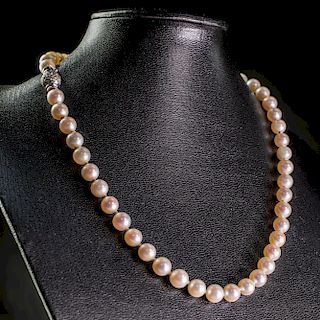 A CULTURED PEARL NECKLACE, the uniform cultured pearls stru