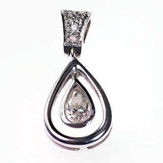 AN 18CT WHITE GOLD AND DIAMOND PENDANT, the oval cut pendan
