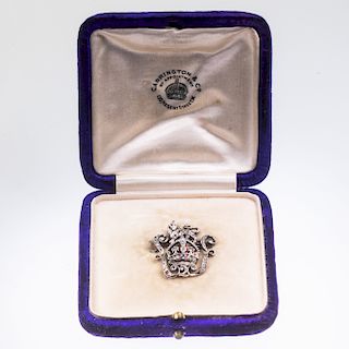 AN ENAMEL AND DIAMOND REGIMENTAL BROOCH, the crown with red
