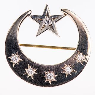 A DIAMOND SET BROOCH, the crescent mount with star mount hi