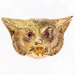 A 9CT YELLOW GOLD BROOCH, modelled as fox head with ruby se