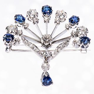 A SAPPHIRE AND DIAMOND BROOCH, the fan style mount of sapph