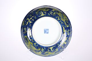 A CHINESE SU-SANCAI DRAGON DISH, glazed in blue, green and 