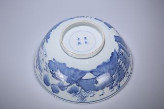 A CHINESE BLUE AND WHITE PORCELAIN BOWL, painted in the rou