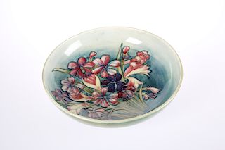 A WALTER MOORCROFT POTTERY BOWL, tubelined and hand-painted