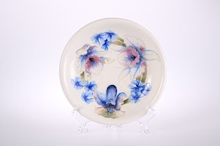 A MOORCROFT SALT-GLAZED PLATE, tubelined and hand-painted w
