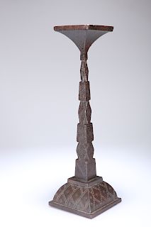 AN IRON CANDLE STAND, with incised line and dot decoration.