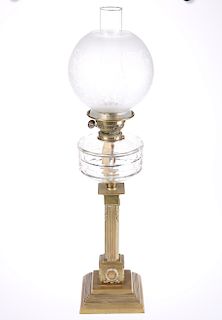 A BRASS COLUMNAR OIL LAMP, C.1900, the square section reede