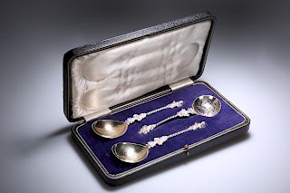 AN EDWARDIAN CASED SET OF TWO SILVER-PLATED APOSTLE FRUIT S