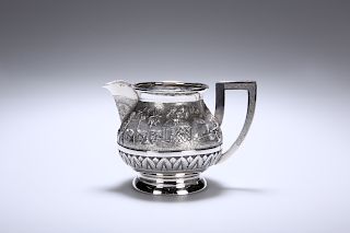 AN INDIAN SILVER CREAM JUG, c. 1900, of spherical form, the