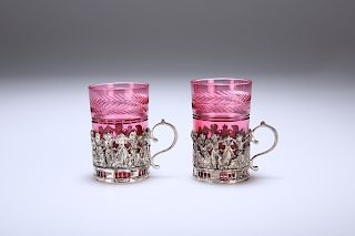 A PAIR OF EDWARDIAN SILVER-MOUNTED CRANBERRY GLASS LIQUEURS