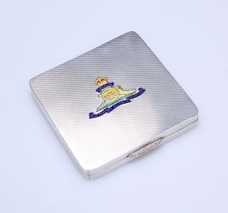 A GEORGE VI ENAMEL-MOUNTED SILVER COMPACT OF MILITARY INTER