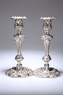 A PAIR OF EARLY VICTORIAN ROCOCO REVIVAL SILVER CANDLESTICK