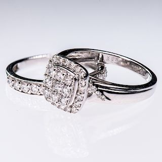 A 9CT WHITE GOLD AND DIAMOND CLUSTER RING, the square shape