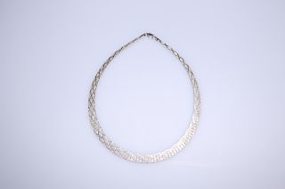 A SILVER COLLAR, of flattened tapering links, stamped 925. 