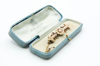 A LATE 19TH CENTURY PEARL SET BROOCH, the central flower he