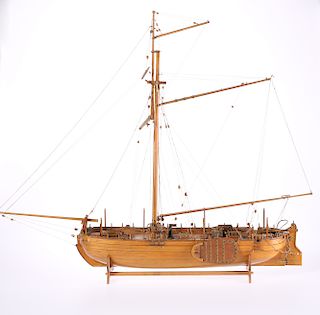 A WOODEN MODEL OF A GALLEON, on stand. 61.5cm high