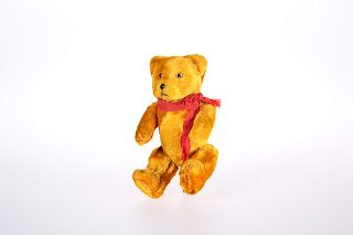 A RARE BICYCLE TEDDY BEAR CLIP, possibly Schuco, with butto