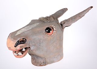 A STRIKING VINTAGE PANTOMIME COMIC HORSE'S HEAD, modelled i