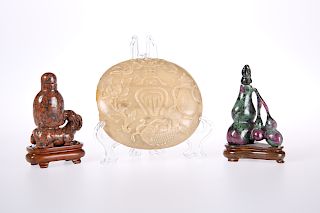 TWO CHINESE CARVED HARDSTONE FLASKS AND COVERS, one modelle