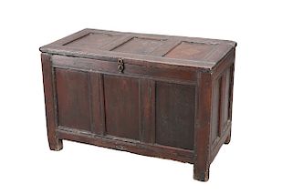 A LATE 17TH CENTURY OAK COFFER, with three panel lid and fr