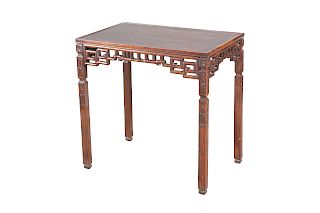 A CHINESE HARDWOOD TABLE, with pierced apron and square sec