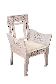 AN ANGLO-CEYLONESE ARTS AND CRAFTS WEATHERED TEAK ARMCHAIR,