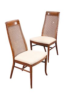 A PAIR OF SCOTTISH STAINED BEECH AND CANEWORK CHAIRS, IN TH
